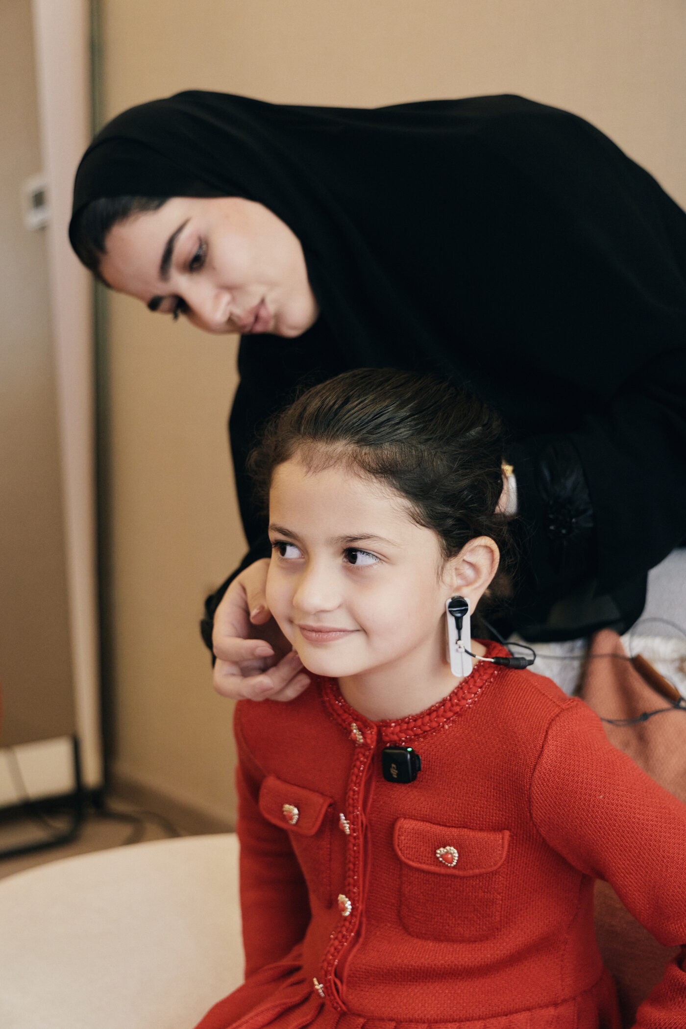 Child wearing neurofeedback sensors during a brain training session at MindTune Dubai
